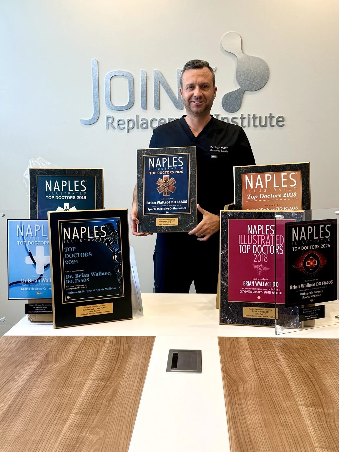 Dr. Brian Wallace with Naples Illustrated Top Doctors recognitions